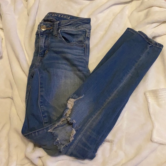 Ripped blue skinny jeans